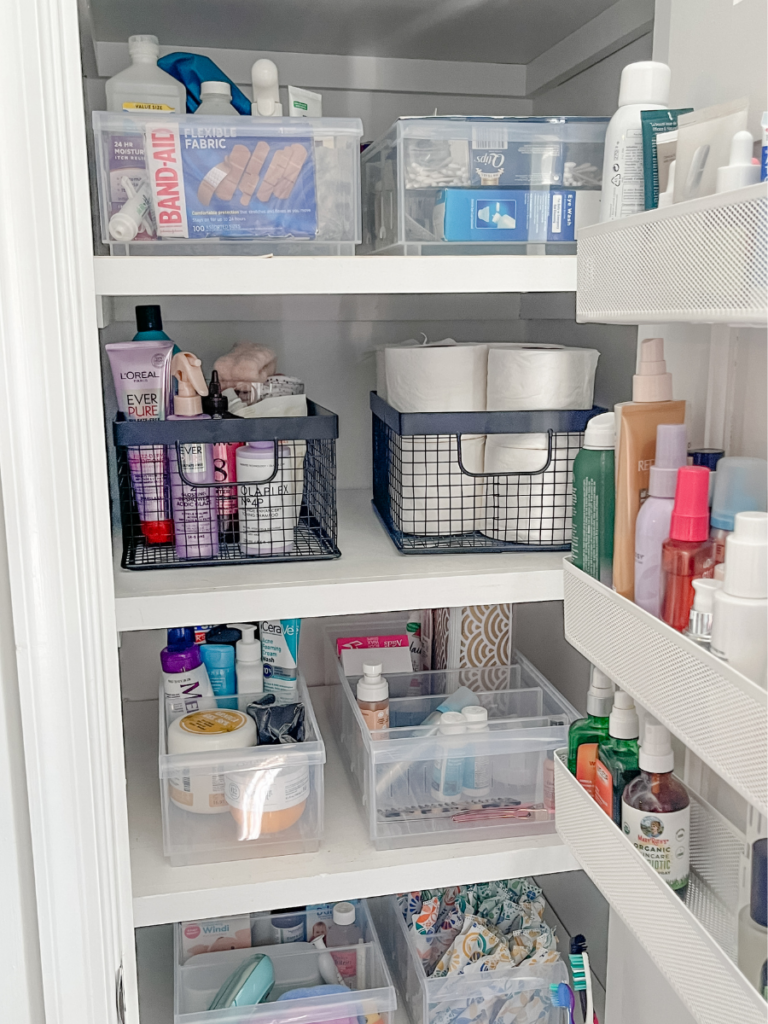 Organized Bathroom Closet |  Professional organizer guide to unpacking and moving in organized in Richmond, VA